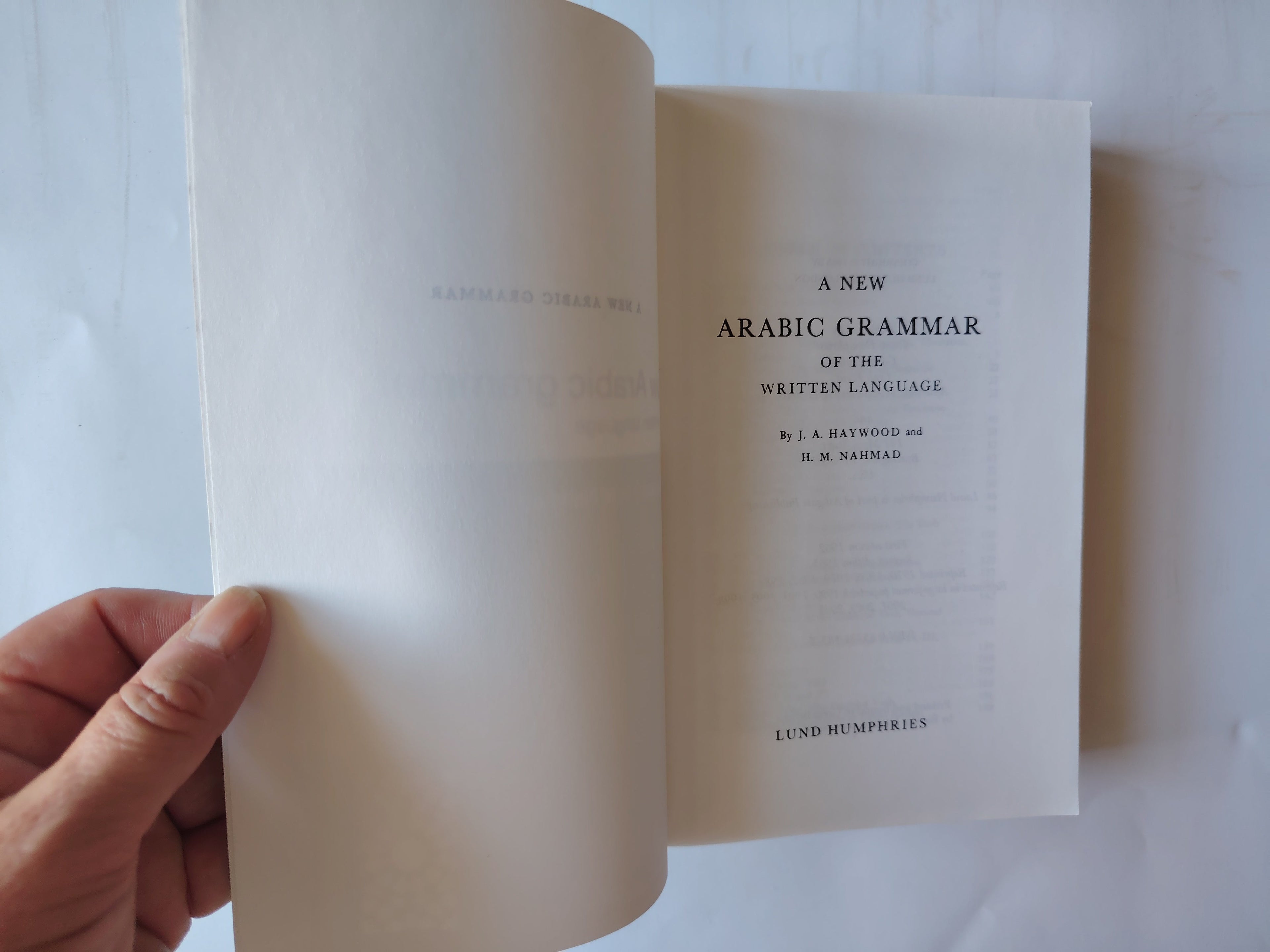 A new Arabic grammar of the written language J A Haywood and H M Nahmad 2005 Paperback Book