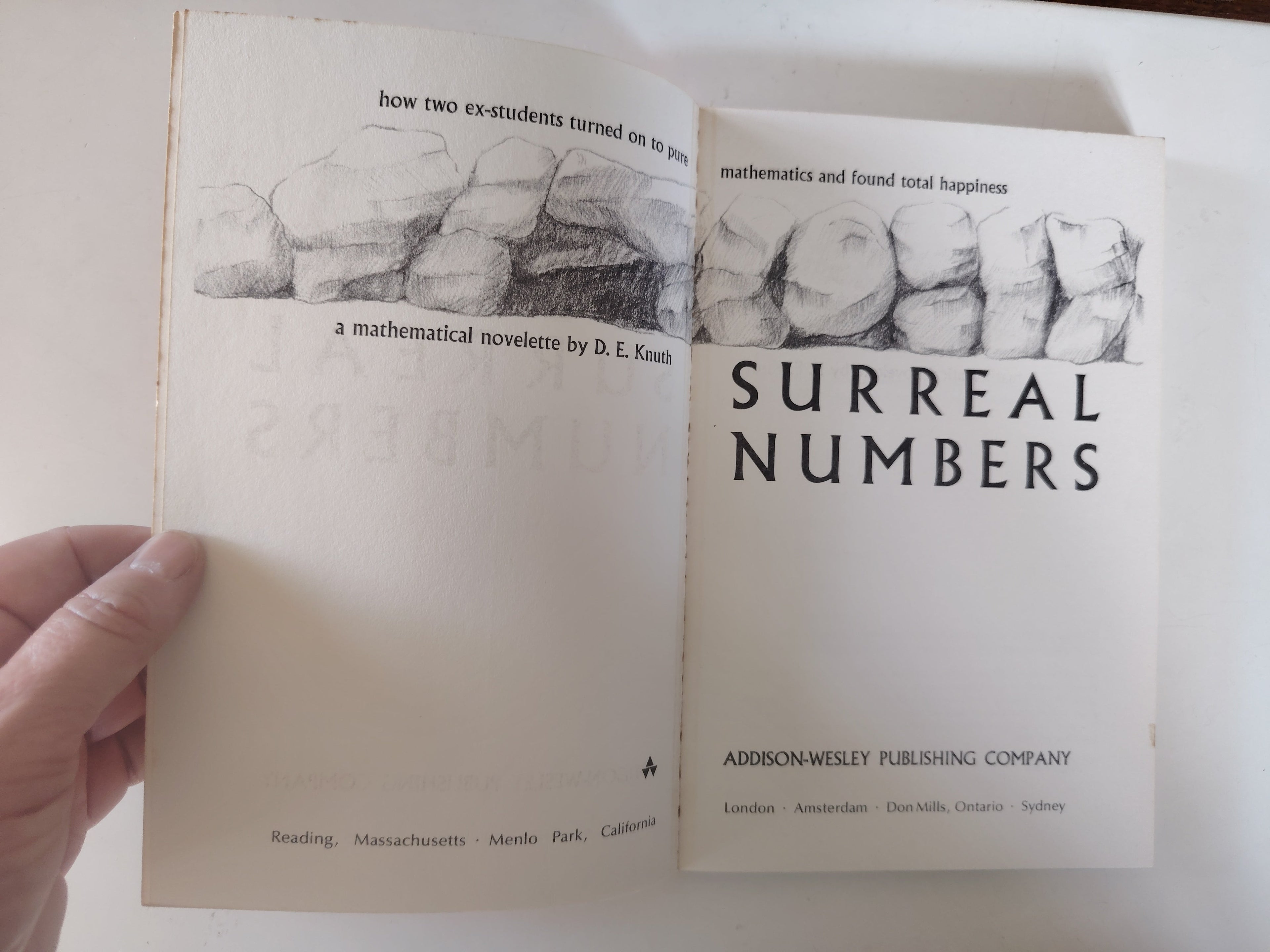 Surreal Numbers by D E Knuth A Mathematical Novelette First Edition 1974